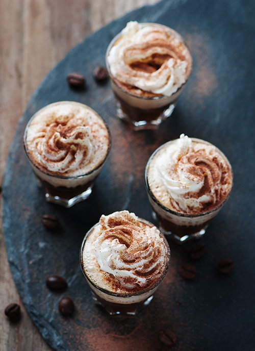 Delicious coffee with crean and cocoa